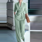 Elegantes Kostüm für Damen mit Krawattengürtel und weit geschnittener Hose